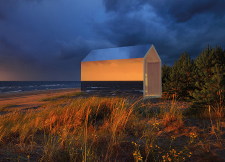 Reflective Aluminum Cabins Crafted from Timber and Engineered for Coastal Retreats