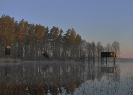 Charred Wooden Shingles and Cross-Laminated Timber Elevate Sustainable Retreats in Latvian Landscapes