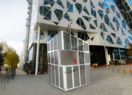 Polycarbonate Facade with Reconstituted Timber Supports for a Compact Urban Kiosk