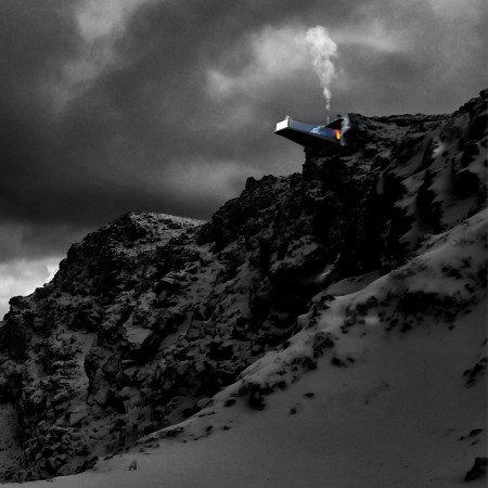 Buried Concrete Form Integrating Natural Rock for Reflective Introspection