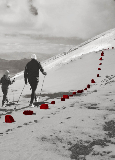 Crimson Pathways and Local Stone Lookouts in a Volcanic Landscape