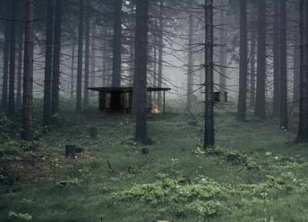 Thatched Roof Pavilions Embracing Forest Retreats with Central Hearths