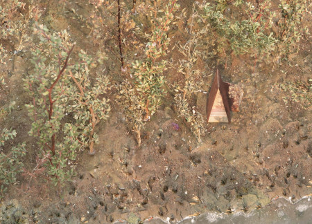 Triangular Void Cabin Made of White Pine and Reclaimed Wood in Forest Retreat