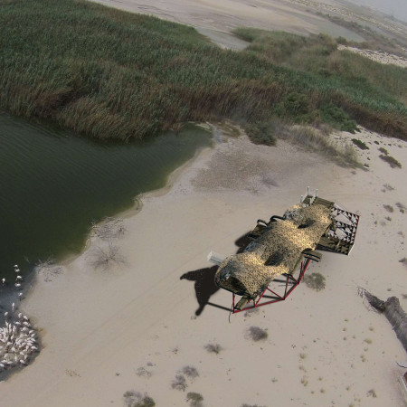 Charred Timber Canopy and Recycled Wood Pathways Creating an Immersive Wetland Experience
