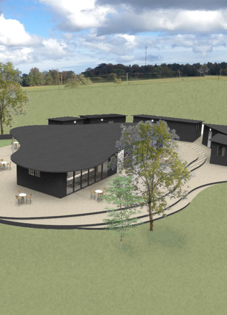 Burned Cladding and Recycled Timber Create Harmonious Huts in a Natural Landscape