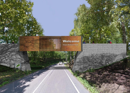 Weathering Steel Overhang Anchoring a Cubic Entry Point to Nature