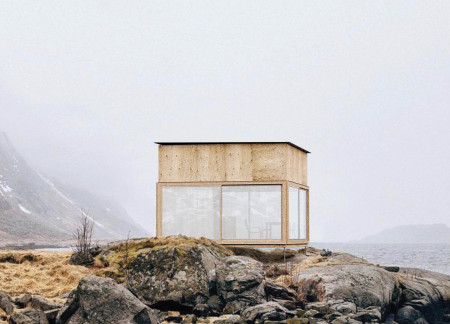 Glazed Partitions and Wooden Columns Enhance Flexible Living Space