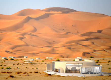 Circular Elevation in Desert Sand with Camouflaged Cabins