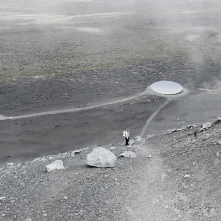 Concave Steel Roof Reflecting Volcanic Landscape in Northern Iceland