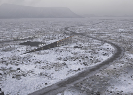 Volcanic Cement Walls Framing Natural Light in a Community Theater