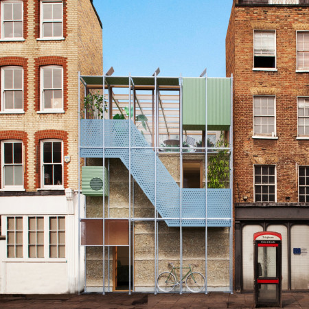 Rooftop Greenhouse with Rammed Earth and Wooden Fiber Insulation