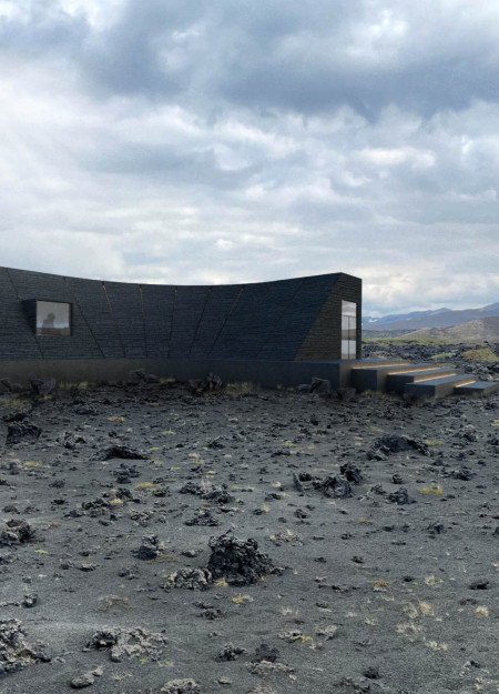 Burnt Wood Facade Framing Views of Volcanic Landscape in Visitor Center and Coffee Shop