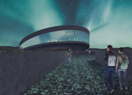 Reflective Glass Facade Framing Volcanic Landscapes with Dark Concrete Accents