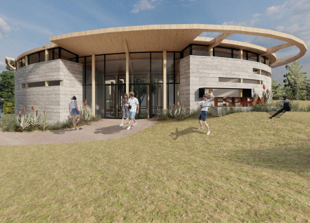 Central Rainwater Garden in a High Performance Metal and Reclaimed Wood Community Center