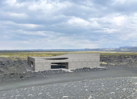 Rammed Earth and Concrete Blend in a Volcanic-Inspired Visitor Hub