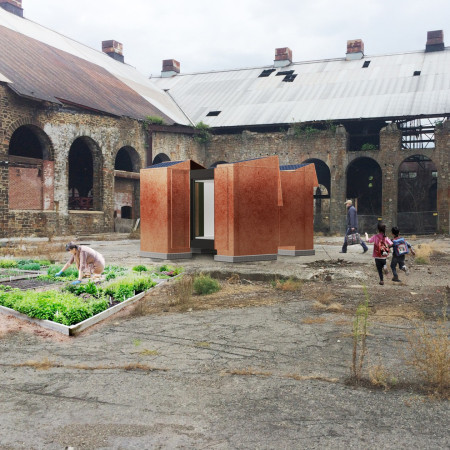 Rusty Steel Shelters with C-Shaped Modularity for Community Housing