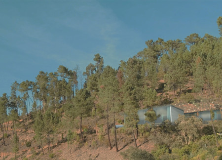 Rammed Earth Serenity with Mountain Views in a Zen-Inspired Retreat