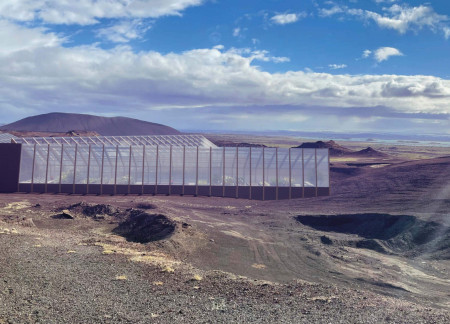 Terraced Greenhouses Embracing Nature with Timber and Concrete
