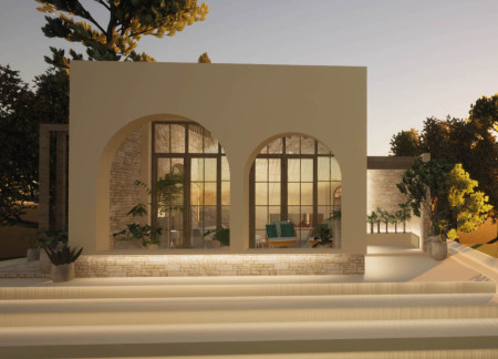 Embracing Nature with Sandstone and Green Spaces in a Communal Umbrian Retreat