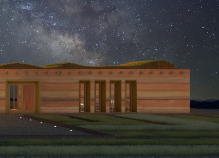 Megalithic Structure Embraces Earthy Textures with Local Sand, Stones, and Wood