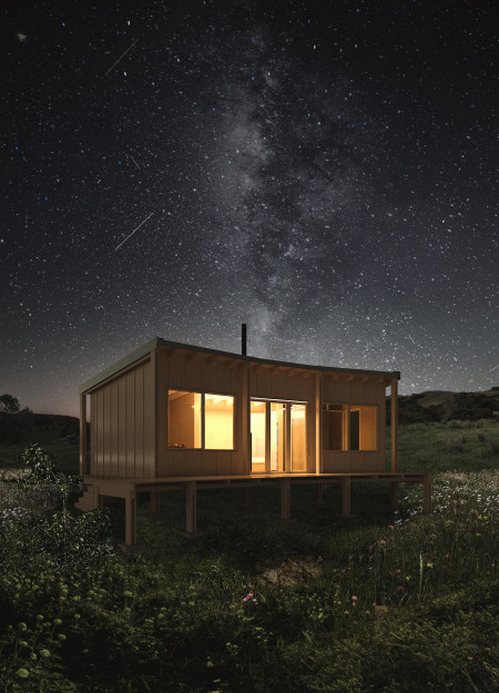 Charred Wooden Shingles and Eco-Ply Panels in an Intimate Retreat Setting