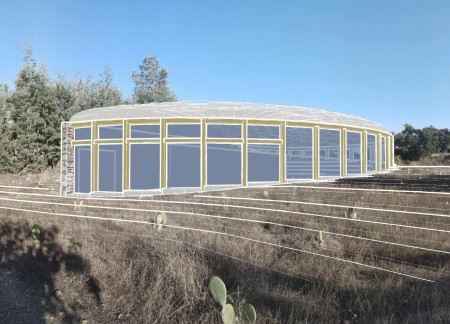 Local Stone and Natural Zinc Embrace a Spiraled Community Space