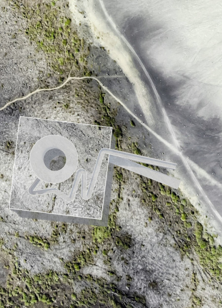 Inverted Oculus Framing Volcanic Landscapes with Concrete and Metal