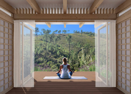 Charred Wooden Shingles and Local Stone Embrace in Meditation Cabins Designed for Harmonious Integration with Nature