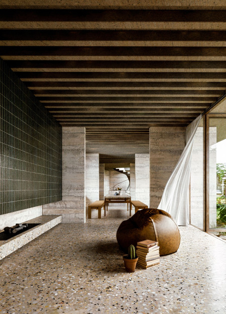 Eco-Conscious Architecture with Undulating Roof and Passive Design