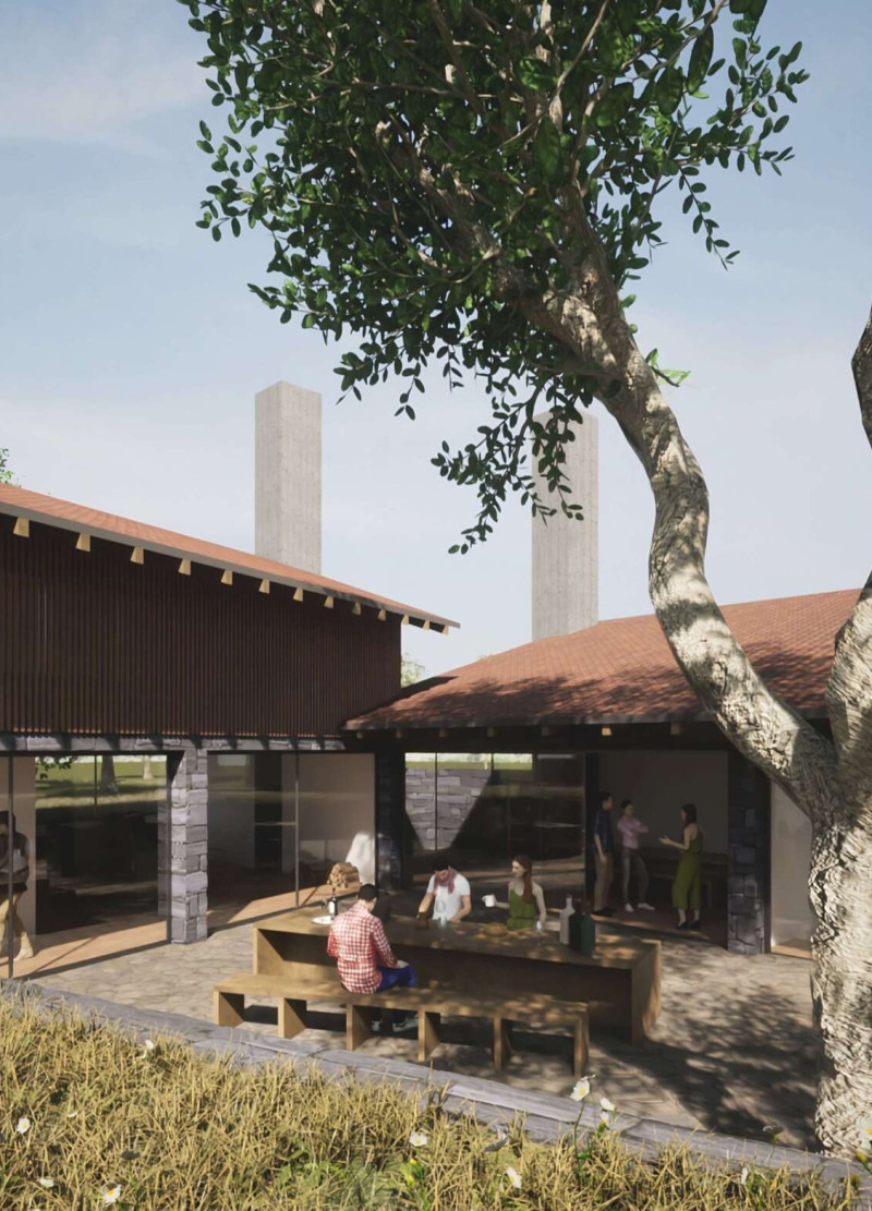 Charred Wooden Shingles and Natural Stone Blend in a Sustainable Guest House Design