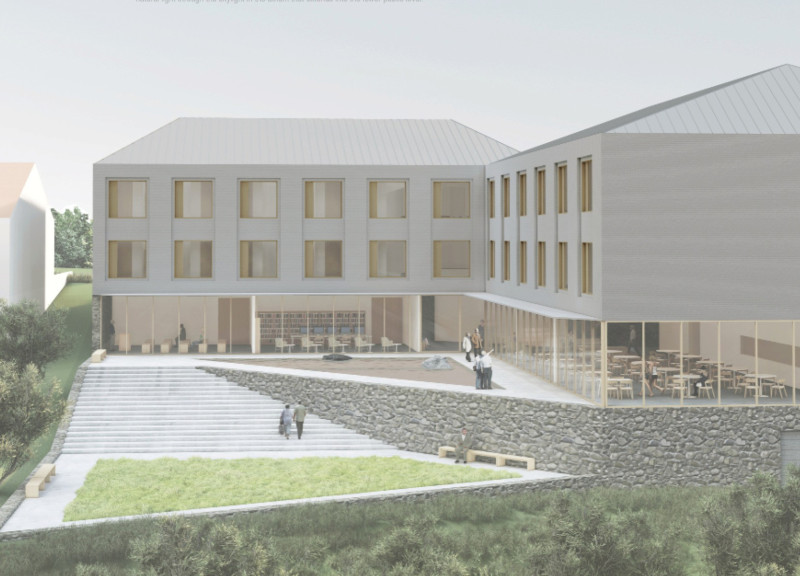 Charred Wood Cladding Surrounding a Central Reflection Pool in a Community-Centric Elderly Facility