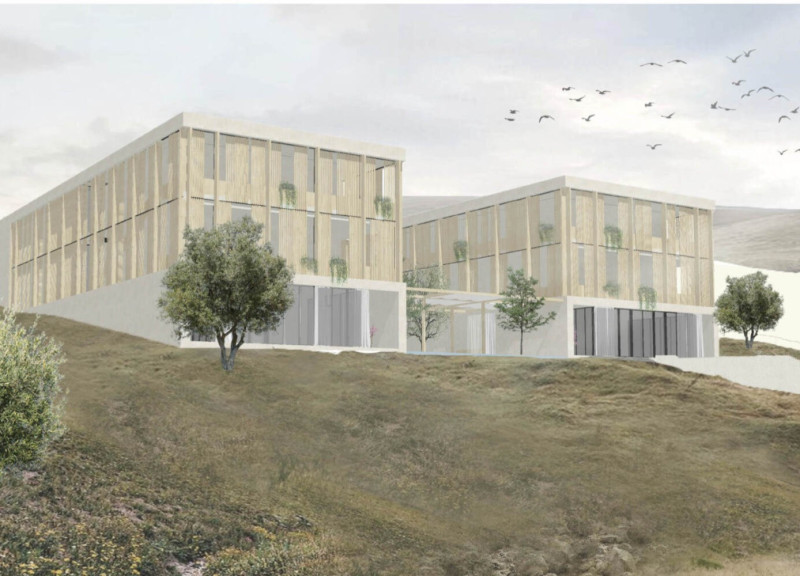 Charred Wooden Shingles and Limestone Facade in Nature-Integrated Elderly Housing