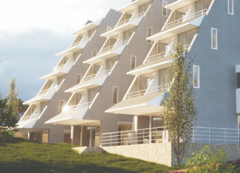 Community Hub Featuring Cast-in-Place Concrete and Local Stone with Integrated Vegetable Gardens
