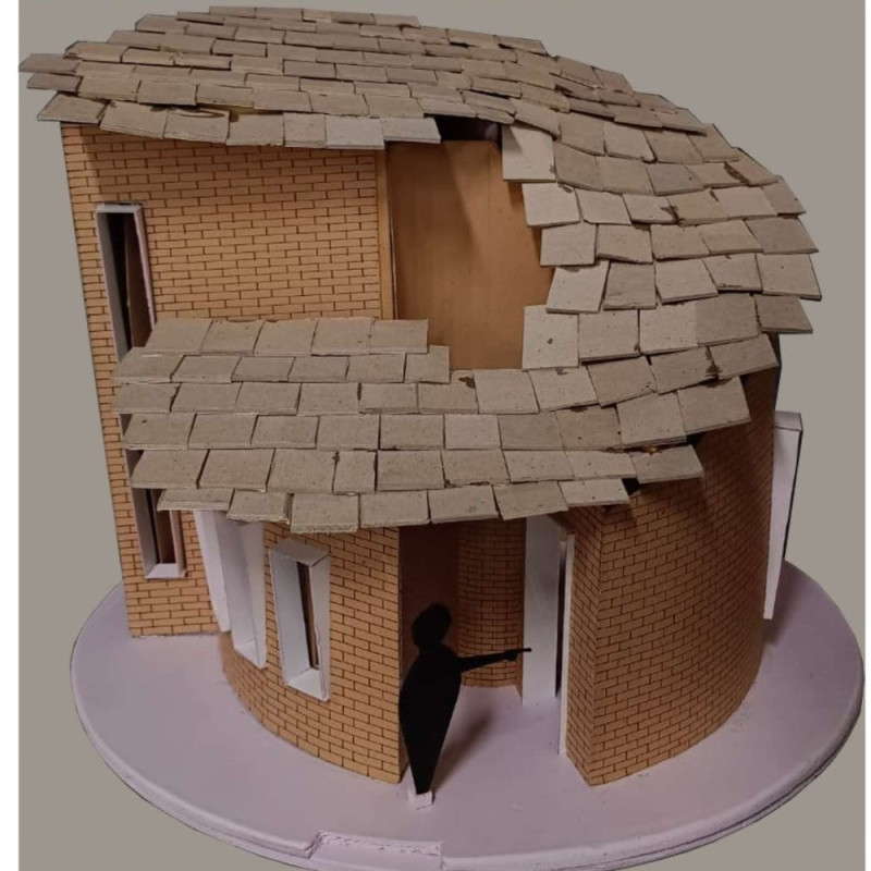 Cylindrical Microhome Crafted from Mud Bricks and Slate Roofing for Sustainable Living