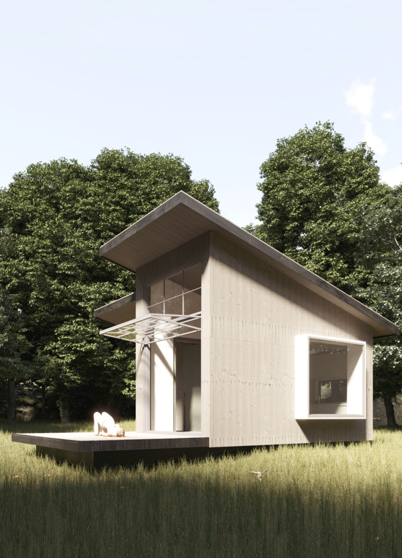 Charred Wooden Shingles and Large Glass Panels Create a Serene Retreat in Latvia's Boglands