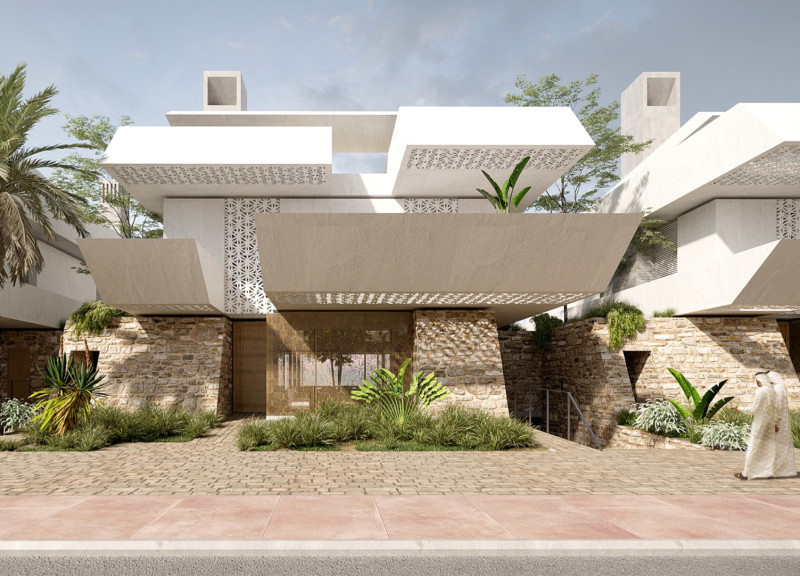 Local Stone and Anodized Bronze Form Community-Centric Courtyard Living in Dubai