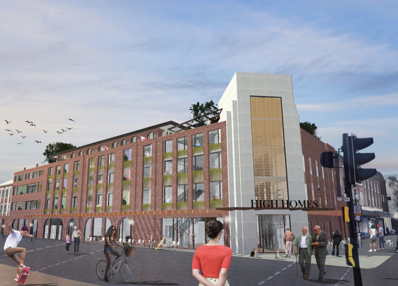 Dual Facade and Community Hub Constructed with Durable Brick and Glazing