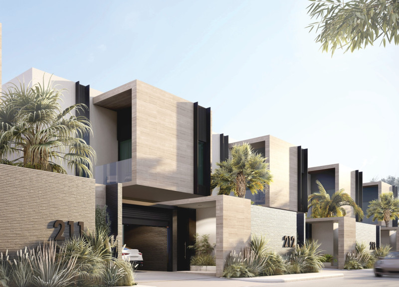 Natural Stone Facades and Flexible Spaces in a Sustainable Family Home