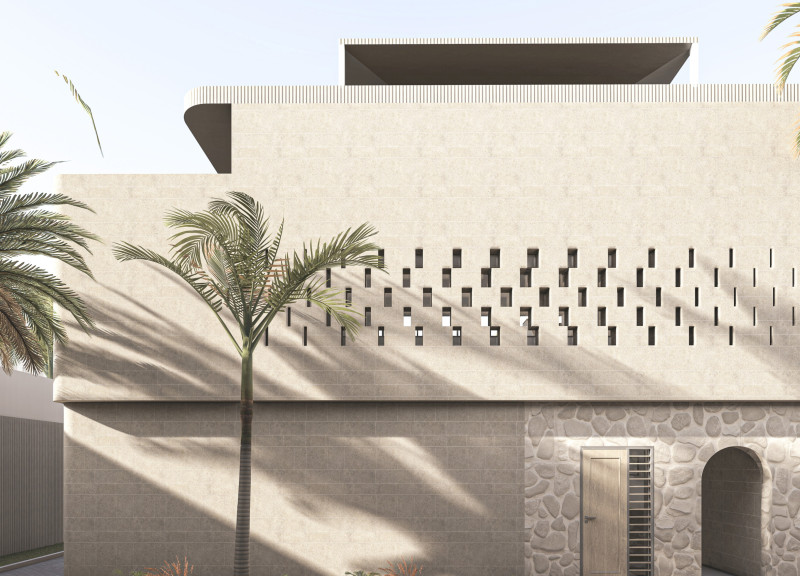 Natural Limestone Facade with Traditional Mashrabiya Screens in a Sustainable Family Residence