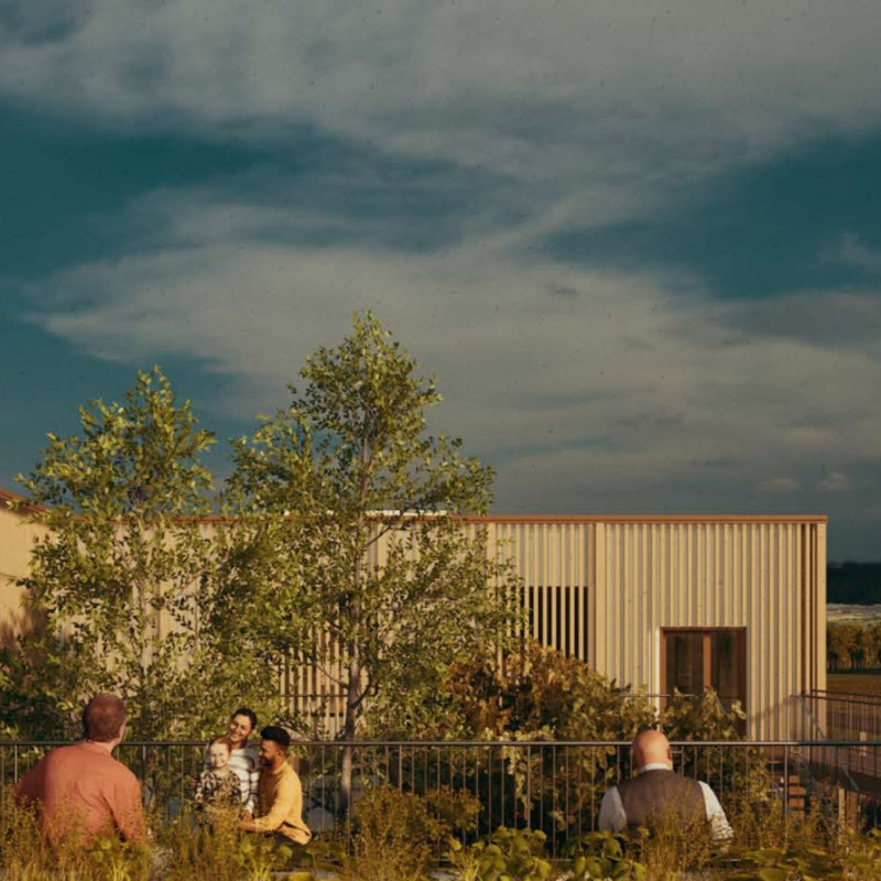 Charred Wood Shingles and Communal Gardens Uniting Seniors in Thoughtful Living Environment