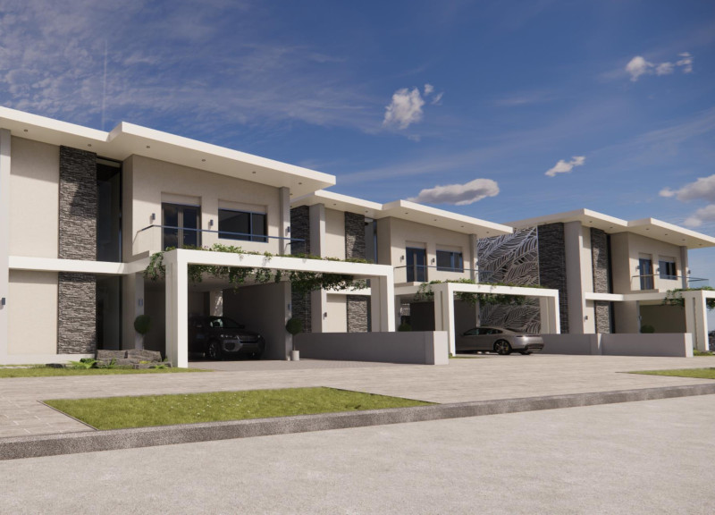 Charred Wooden Shingles and Rainwater Collection in a Family Residence