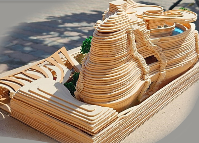 Sustainable Living in Rammed Earth with High-Performance Glass and Native Landscaping