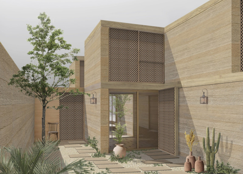 Rammed Earth Walls Enclosed by Biophilic Courtyards in a Flexible Residential Space