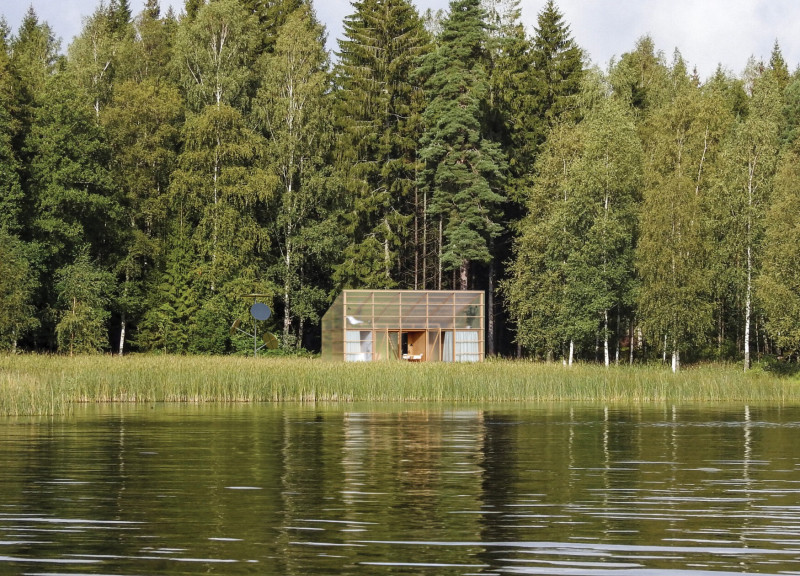 Translucent Polycarbonate and Elevated Wood Structure Enhancing Community Living by the Lake