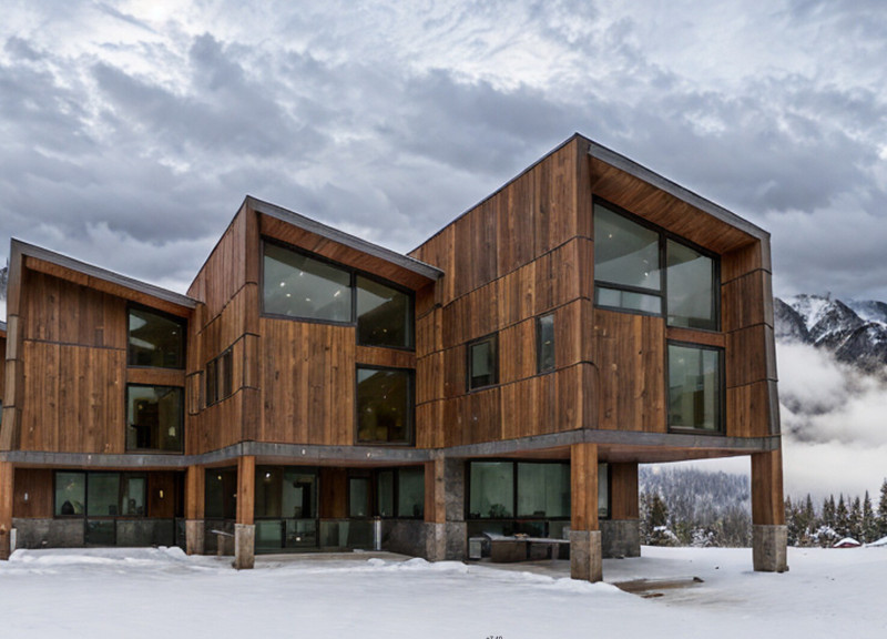 Charred Wooden Shingles and Glazed Facades in a Tiered Mountain Retreat
