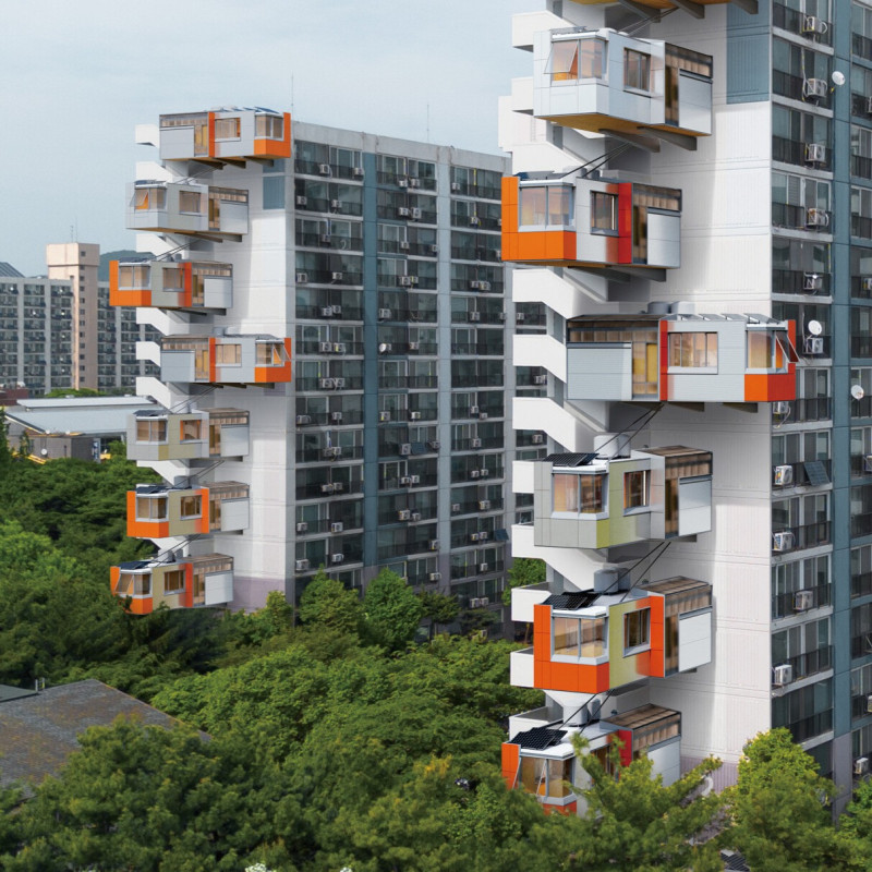 Modular Living Spaces Incorporating Polystyrene Insulation and Rainwater Harvesting Systems Within Urban High-Rise Structures