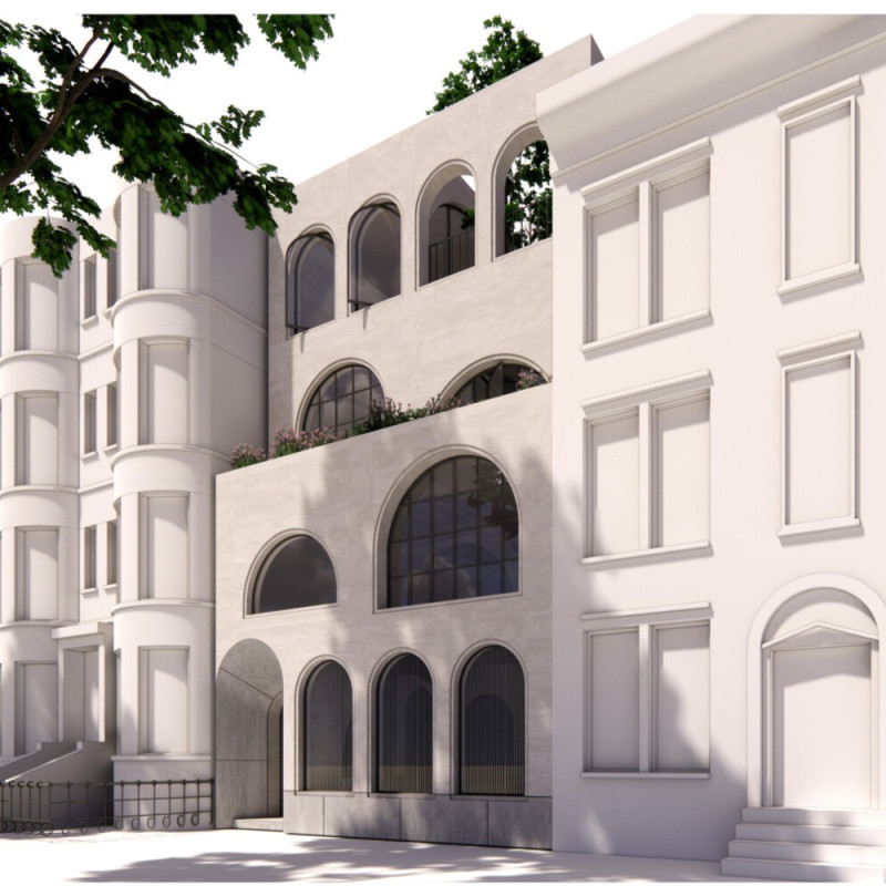 Courtyard Residence Featuring Arched Concrete Forms and Abundant Natural Light