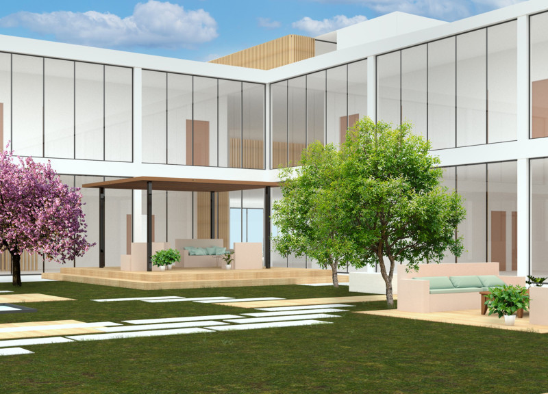 Charred Wooden Shingles Enveloping a Harmonious Hospice Set Within a Central Courtyard