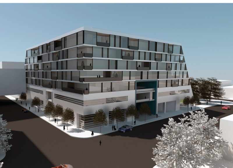 Charred Wood Accents and Glass Façades Defining a Community-Centric Urban Infill Project