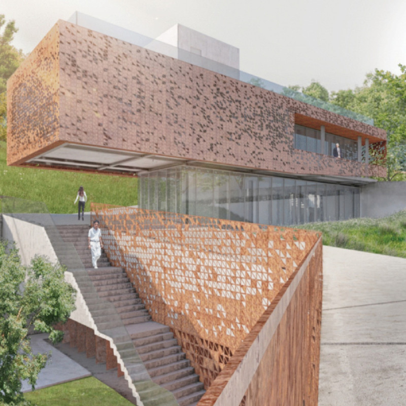 Weathered Corten Steel and Reflective Water Define a Peace Memorial Park